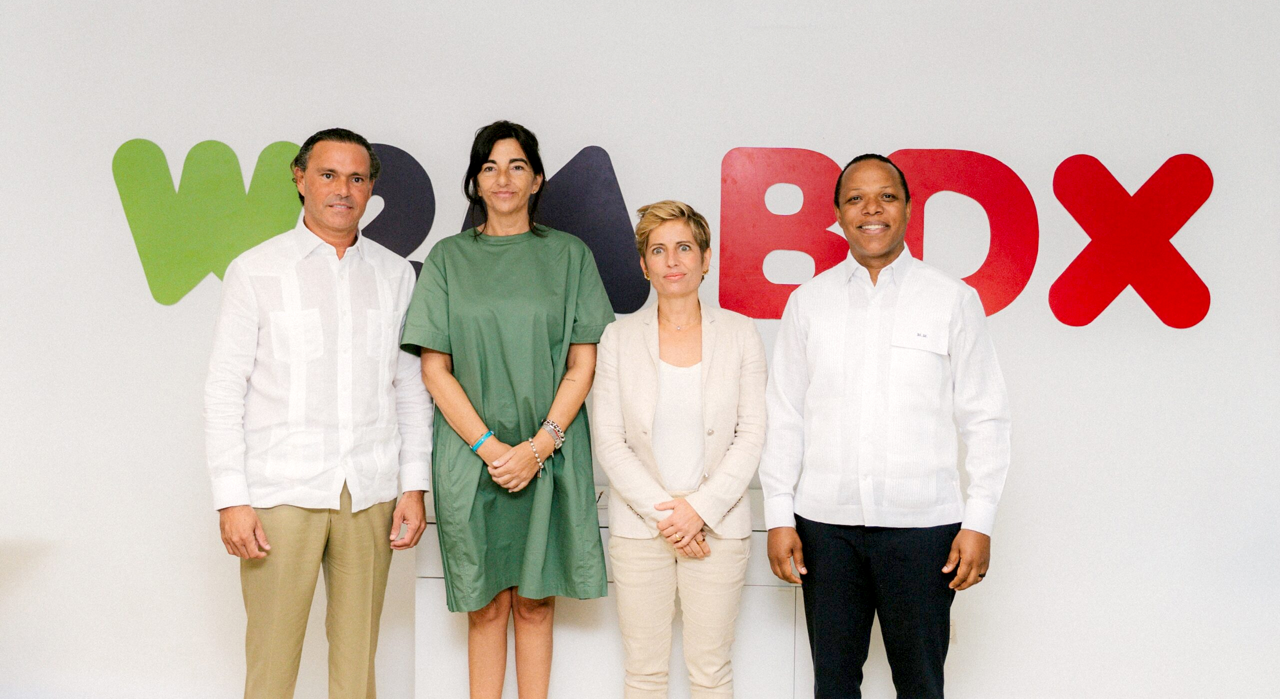 Milton Morrison junto a ejecutivos de World2Meet